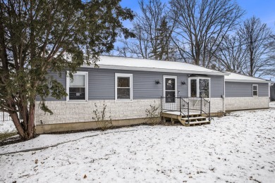 Welcome to your dream ranch-style home, where modern comfort on Alwyn Downs Golf Club in Michigan - for sale on GolfHomes.com, golf home, golf lot