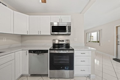 Enjoy easy Florida living in this first-floor 2-bedroom, 2-bath on Kings Point Golf -Flanders Way in Florida - for sale on GolfHomes.com, golf home, golf lot