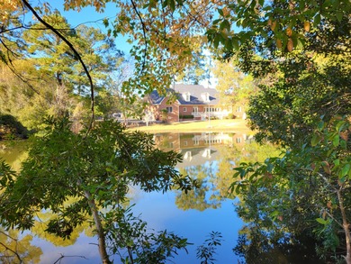 Waterfront Lot overlooking an approx 15 acre pond within the on Santee National Golf Course in South Carolina - for sale on GolfHomes.com, golf home, golf lot