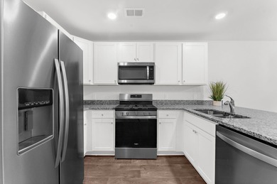 517 Golden Embers Way Pine Hills at Cane Bay End-unit with on Cypress Point Par 3 in South Carolina - for sale on GolfHomes.com, golf home, golf lot