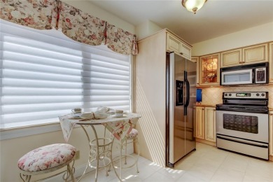Perched on the top corner of the building, this 2-bedroom on Isla Del Sol Yacht and Country Club in Florida - for sale on GolfHomes.com, golf home, golf lot