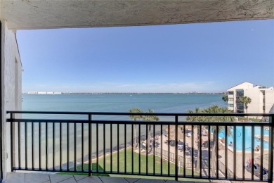 Perched on the top corner of the building, this 2-bedroom on Isla Del Sol Yacht and Country Club in Florida - for sale on GolfHomes.com, golf home, golf lot