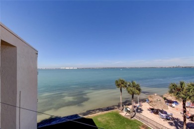 Perched on the top corner of the building, this 2-bedroom on Isla Del Sol Yacht and Country Club in Florida - for sale on GolfHomes.com, golf home, golf lot