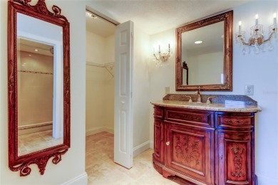 Perched on the top corner of the building, this 2-bedroom on Isla Del Sol Yacht and Country Club in Florida - for sale on GolfHomes.com, golf home, golf lot