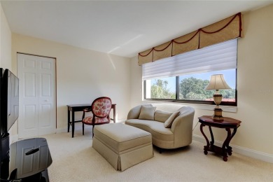 Perched on the top corner of the building, this 2-bedroom on Isla Del Sol Yacht and Country Club in Florida - for sale on GolfHomes.com, golf home, golf lot