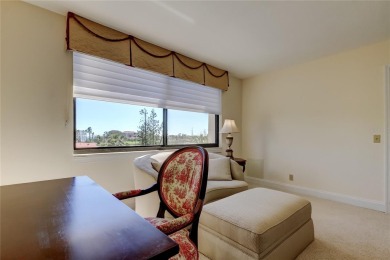 Perched on the top corner of the building, this 2-bedroom on Isla Del Sol Yacht and Country Club in Florida - for sale on GolfHomes.com, golf home, golf lot