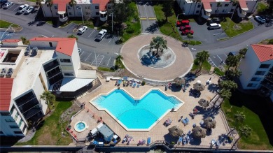 Perched on the top corner of the building, this 2-bedroom on Isla Del Sol Yacht and Country Club in Florida - for sale on GolfHomes.com, golf home, golf lot