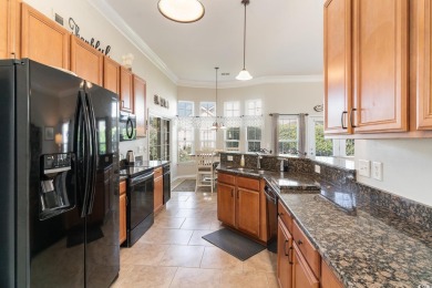 This is an immaculate 4-bedroom, 3-bathroom home in the on Heron Point Golf Club in South Carolina - for sale on GolfHomes.com, golf home, golf lot