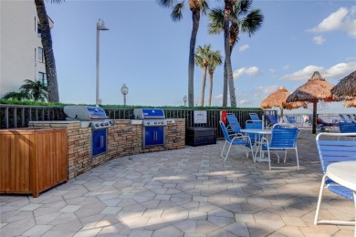 Perched on the top corner of the building, this 2-bedroom on Isla Del Sol Yacht and Country Club in Florida - for sale on GolfHomes.com, golf home, golf lot