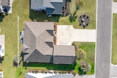 This is an immaculate 4-bedroom, 3-bathroom home in the on Heron Point Golf Club in South Carolina - for sale on GolfHomes.com, golf home, golf lot