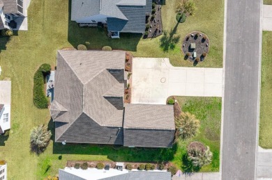 This is an immaculate 4-bedroom, 3-bathroom home in the on Heron Point Golf Club in South Carolina - for sale on GolfHomes.com, golf home, golf lot