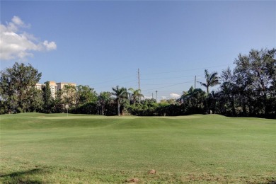 Perched on the top corner of the building, this 2-bedroom on Isla Del Sol Yacht and Country Club in Florida - for sale on GolfHomes.com, golf home, golf lot