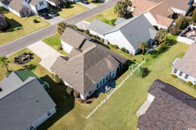 This is an immaculate 4-bedroom, 3-bathroom home in the on Heron Point Golf Club in South Carolina - for sale on GolfHomes.com, golf home, golf lot