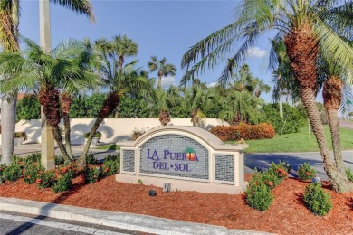 Perched on the top corner of the building, this 2-bedroom on Isla Del Sol Yacht and Country Club in Florida - for sale on GolfHomes.com, golf home, golf lot