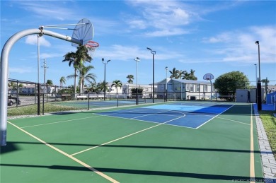 Charming waterfront home-1 bedroom, 1.5 bath. Beautifully on Island Dunes Country Club in Florida - for sale on GolfHomes.com, golf home, golf lot