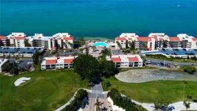 Perched on the top corner of the building, this 2-bedroom on Isla Del Sol Yacht and Country Club in Florida - for sale on GolfHomes.com, golf home, golf lot