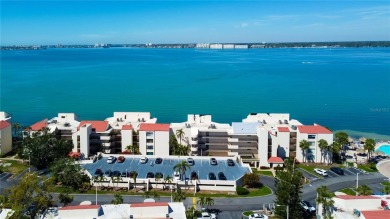 Perched on the top corner of the building, this 2-bedroom on Isla Del Sol Yacht and Country Club in Florida - for sale on GolfHomes.com, golf home, golf lot