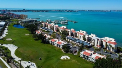 Perched on the top corner of the building, this 2-bedroom on Isla Del Sol Yacht and Country Club in Florida - for sale on GolfHomes.com, golf home, golf lot