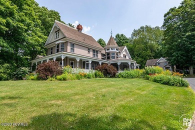 Logan's Bower is a meticulously restored Victorian home with a on Tupper Lake Country Club in New York - for sale on GolfHomes.com, golf home, golf lot