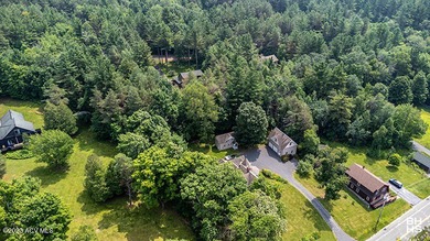 Logan's Bower is a meticulously restored Victorian home with a on Tupper Lake Country Club in New York - for sale on GolfHomes.com, golf home, golf lot