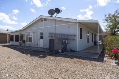 Furnished 3 bedroom 2 bath. Has a large added on Arizona room on Dave White Reg Park and Golf Course in Arizona - for sale on GolfHomes.com, golf home, golf lot