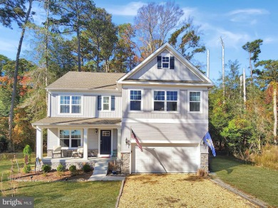 Charming 4-Bedroom Home with Stunning Bay Views in Captains Cove on Captains Cove Golf and Yacht Club in Virginia - for sale on GolfHomes.com, golf home, golf lot