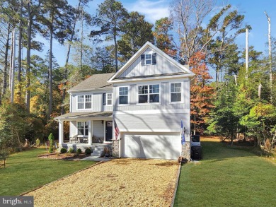 Charming 4-Bedroom Home with Stunning Bay Views in Captains Cove on Captains Cove Golf and Yacht Club in Virginia - for sale on GolfHomes.com, golf home, golf lot