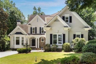 This beautiful home overlooks the golf course with primary on on The Golf Club of Georgia in Georgia - for sale on GolfHomes.com, golf home, golf lot