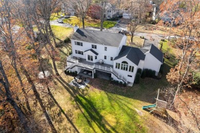 Beautifully reimagined inside and out, this magnificent Colonial on Quaker Ridge Golf Club in New York - for sale on GolfHomes.com, golf home, golf lot