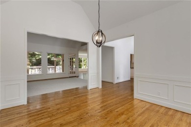 This beautiful home overlooks the golf course with primary on on The Golf Club of Georgia in Georgia - for sale on GolfHomes.com, golf home, golf lot