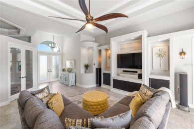 Set amidst private preserve and golf views, this better-than-new on Royal Tee Country Club in Florida - for sale on GolfHomes.com, golf home, golf lot