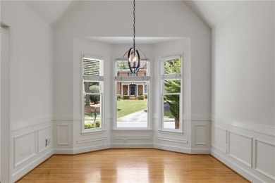 This beautiful home overlooks the golf course with primary on on The Golf Club of Georgia in Georgia - for sale on GolfHomes.com, golf home, golf lot