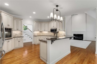 This beautiful home overlooks the golf course with primary on on The Golf Club of Georgia in Georgia - for sale on GolfHomes.com, golf home, golf lot