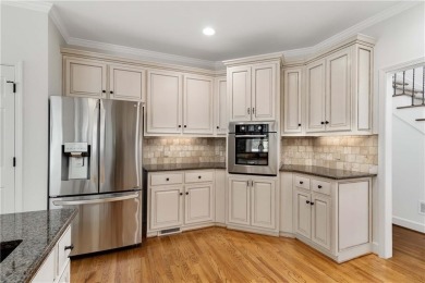This beautiful home overlooks the golf course with primary on on The Golf Club of Georgia in Georgia - for sale on GolfHomes.com, golf home, golf lot