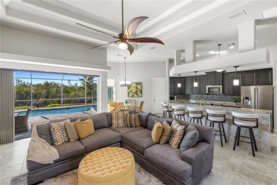 Set amidst private preserve and golf views, this better-than-new on Royal Tee Country Club in Florida - for sale on GolfHomes.com, golf home, golf lot