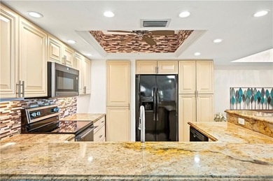 THE BEST VALUE IN BONITA BAY! FIRST FLOOR, 2 BED + DEN, COMPLETE on Bonita Bay West in Florida - for sale on GolfHomes.com, golf home, golf lot