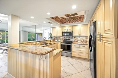 THE BEST VALUE IN BONITA BAY! FIRST FLOOR, 2 BED + DEN, COMPLETE on Bonita Bay West in Florida - for sale on GolfHomes.com, golf home, golf lot