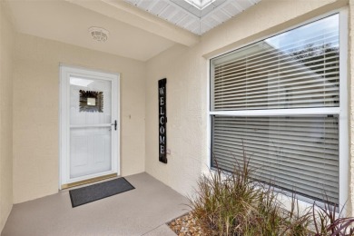 TURNKEY 3/2 FOXGLOVE COURTYARD VILLA with GOLF FRONT VIEWS, SWIM on The Links of Spruce Creek in Florida - for sale on GolfHomes.com, golf home, golf lot
