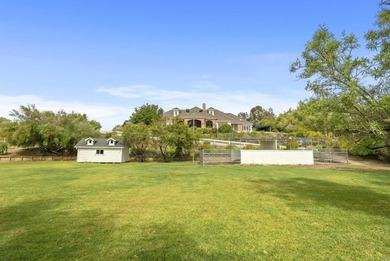 Set on nearly three acres in the rolling hills of Olivenhain on  in California - for sale on GolfHomes.com, golf home, golf lot