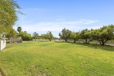 Set on nearly three acres in the rolling hills of Olivenhain on  in California - for sale on GolfHomes.com, golf home, golf lot