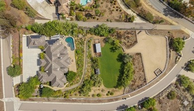 Set on nearly three acres in the rolling hills of Olivenhain on  in California - for sale on GolfHomes.com, golf home, golf lot