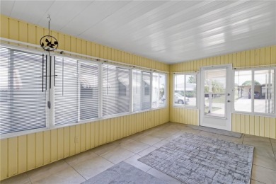 I LOVE THIS HOME! Over 1,300 sq. ft. of comfort and charm. Enjoy on Barefoot Bay Golf Course in Florida - for sale on GolfHomes.com, golf home, golf lot
