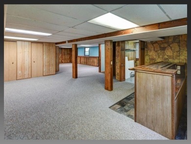 SET FOR LIVING with over 1.5 Acres located in desirable location on The Oaks Golf Course in Wisconsin - for sale on GolfHomes.com, golf home, golf lot