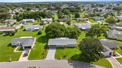 Beautiful 2 Bed, 2 Bath, 2 car attached garage facing front on The Links of Spruce Creek in Florida - for sale on GolfHomes.com, golf home, golf lot