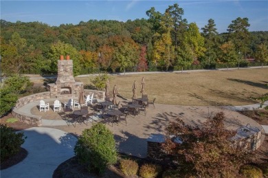 Nestled at the end of a serene cul-de-sac, this charming house on Lanier Island Legacy Golf Couorse in Georgia - for sale on GolfHomes.com, golf home, golf lot