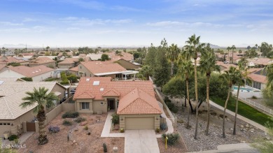 Nestled in a vibrant gated active adult community, this stunning on Palo Verde Golf and Country Club in Arizona - for sale on GolfHomes.com, golf home, golf lot