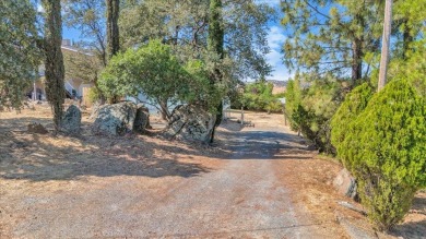 Discover a slice of vintage charm in this affordable barn-style on The Club at Copper Valley Golf Course in California - for sale on GolfHomes.com, golf home, golf lot