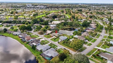 Welcome to this Naples POOL HOME retreat with incredible WATER on Lakewood Country Club in Florida - for sale on GolfHomes.com, golf home, golf lot