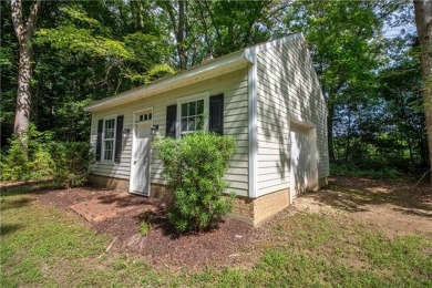 This exquisite 3,000+ square foot residence offers luxury and on Piankatank River Golf Club in Virginia - for sale on GolfHomes.com, golf home, golf lot