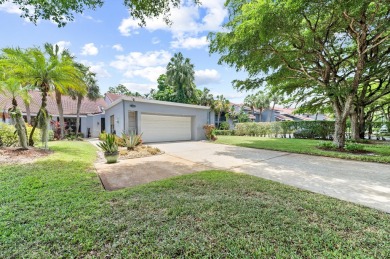 You will love the quiet cul-de-sac location, tropical oasis on Indian Spring Golf and Country Club in Florida - for sale on GolfHomes.com, golf home, golf lot